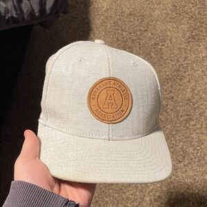 H&M Cream Cap with Brown Patch